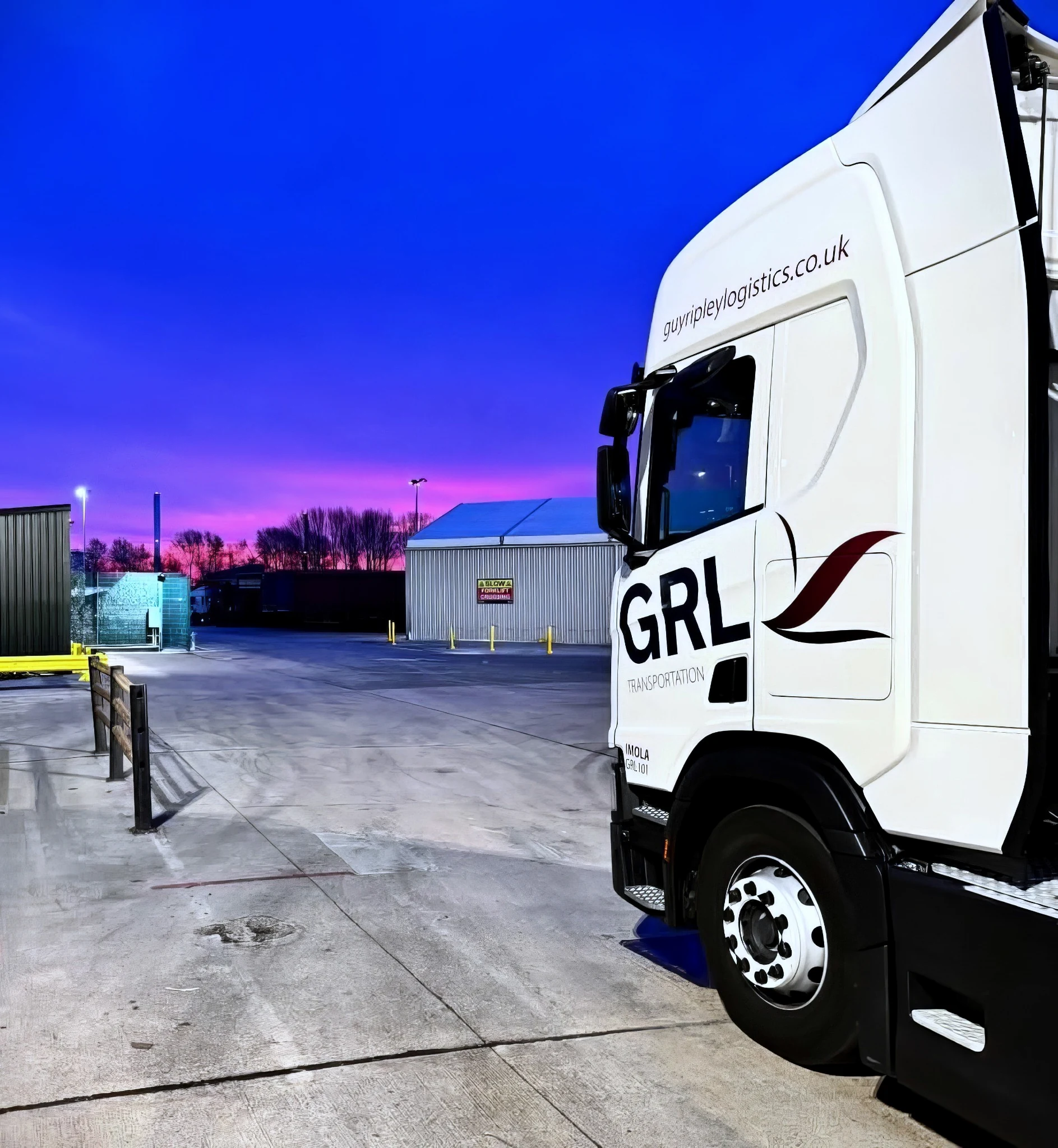 GRL corporate logistics vehicle at dusk